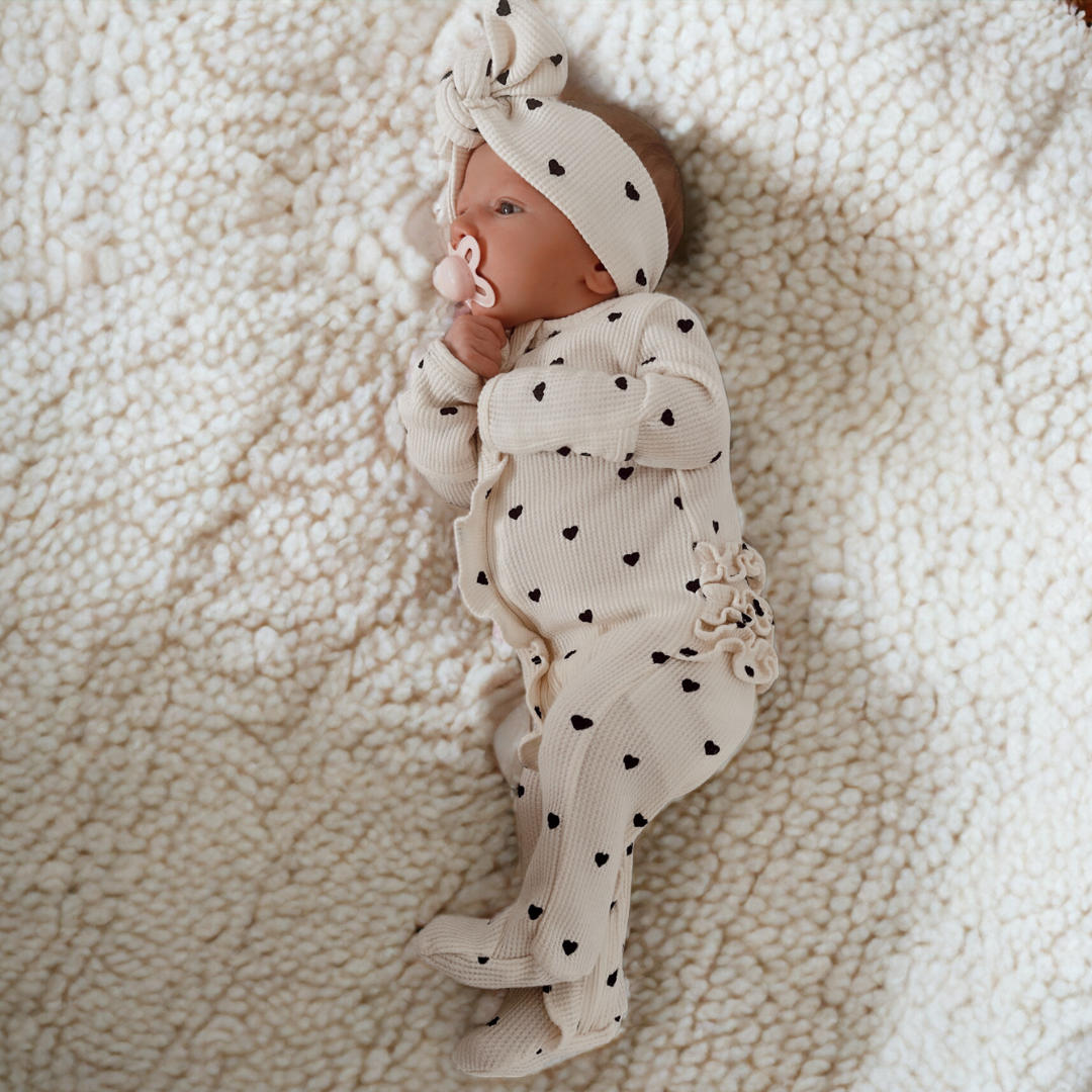 Organic Waffle 2-Way Zip Ruffle Footie, Black Heart